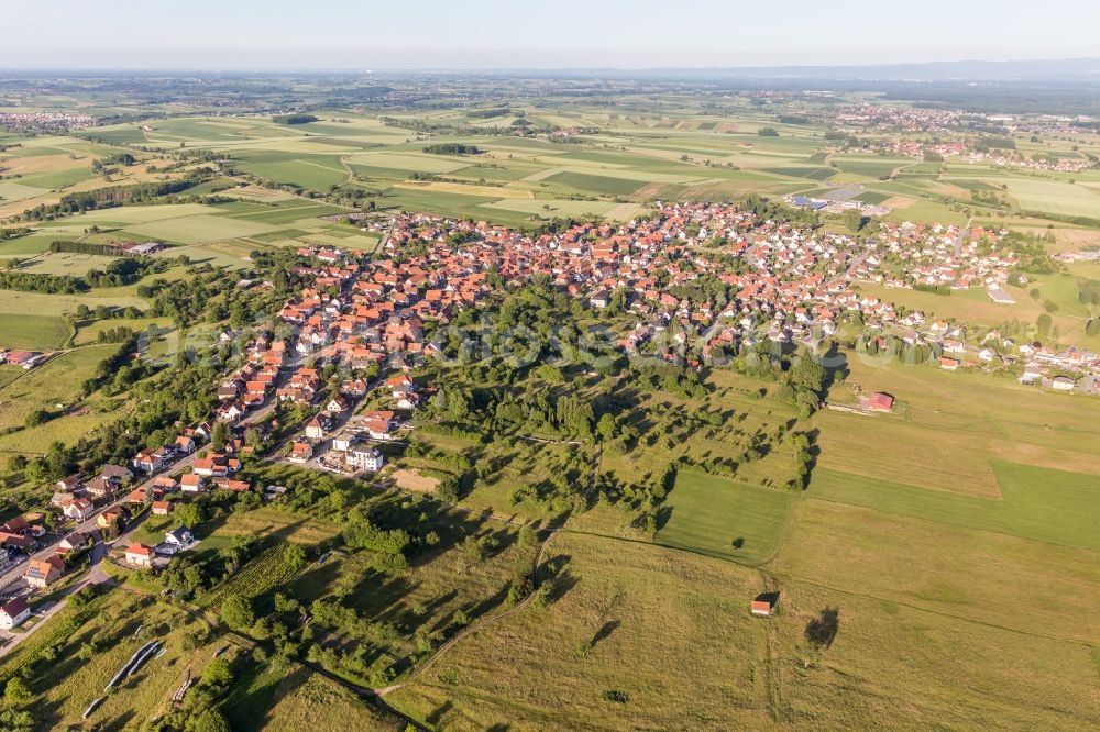 Surbourg from above - Village - view on the edge of agricultural fields and farmland in Surbourg in Grand Est, France