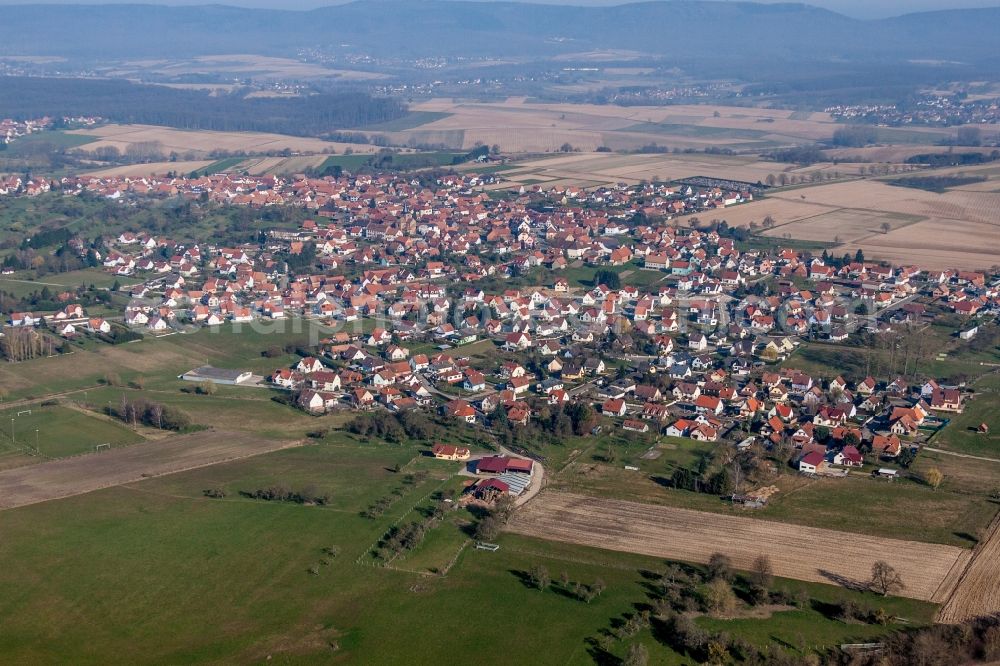 Surbourg from above - Village - view on the edge of agricultural fields and farmland in Surbourg in Grand Est, France