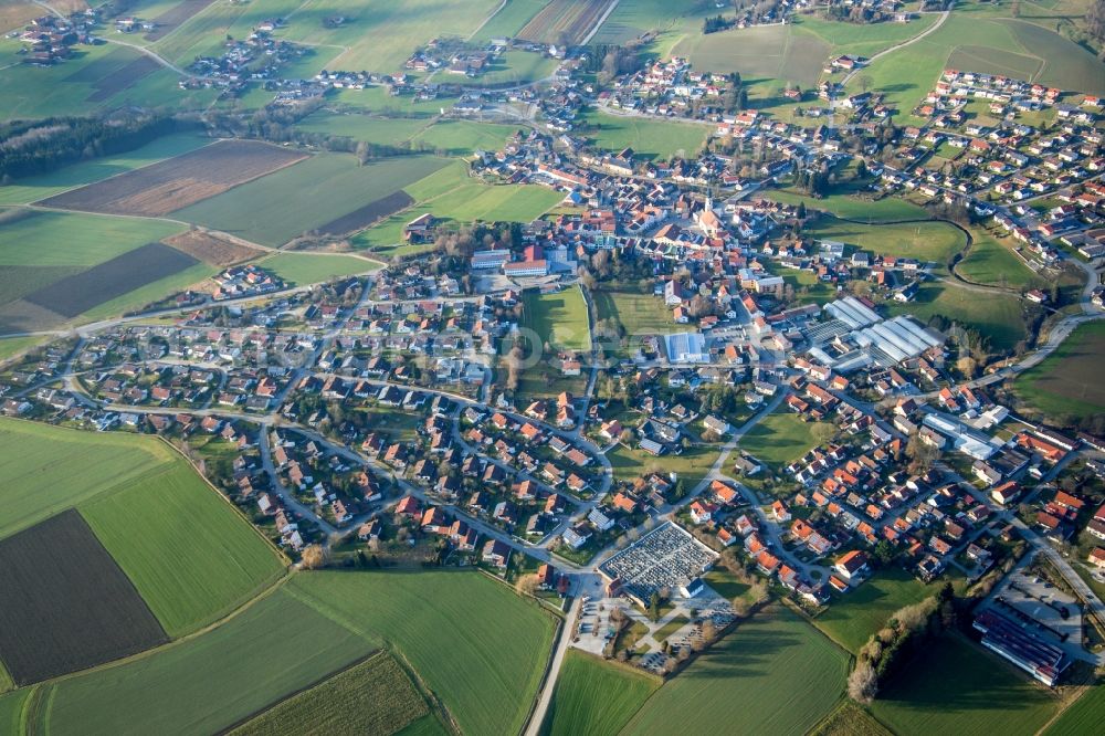 Triftern from the bird's eye view: Village - view on the edge of agricultural fields and farmland in Triftern in the state Bavaria, Germany