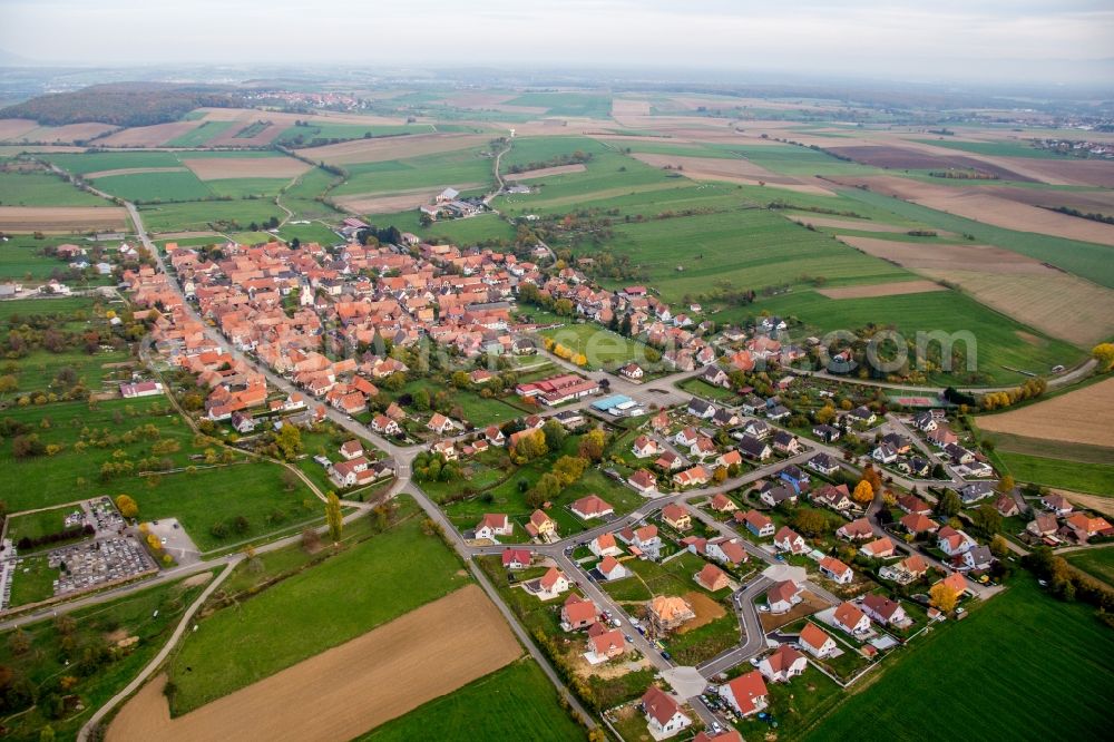 Uhrwiller from above - Village - view on the edge of agricultural fields and farmland in Uhrwiller in Grand Est, France