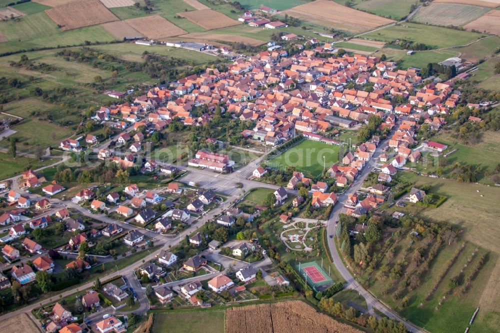 Uhrwiller from above - Village - view on the edge of agricultural fields and farmland in Uhrwiller in Grand Est, France