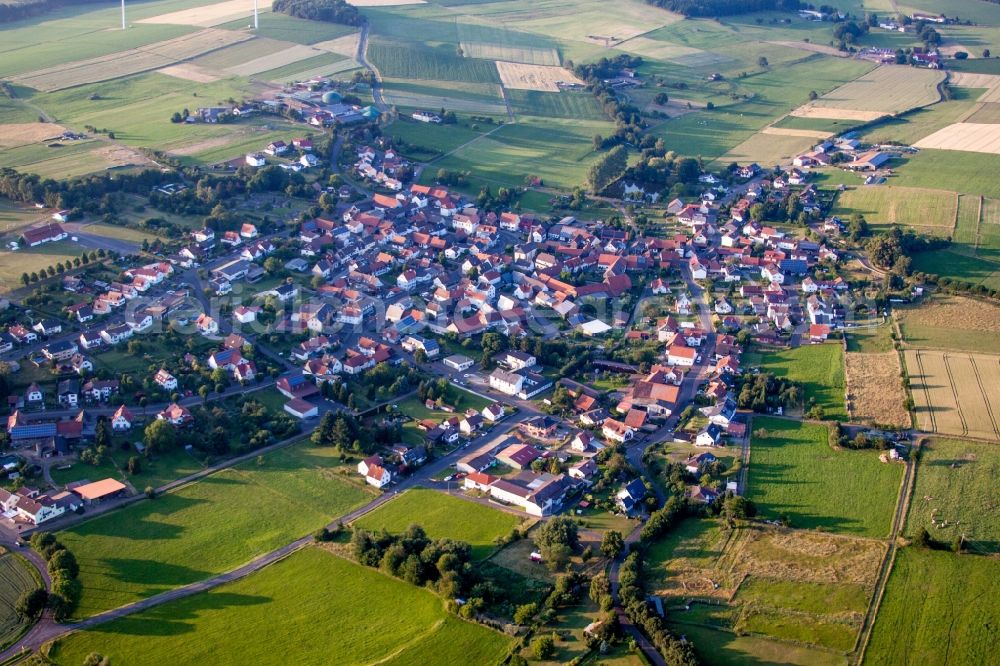 Wenings from above - Village - view on the edge of agricultural fields and farmland in Wenings in the state Hesse, Germany