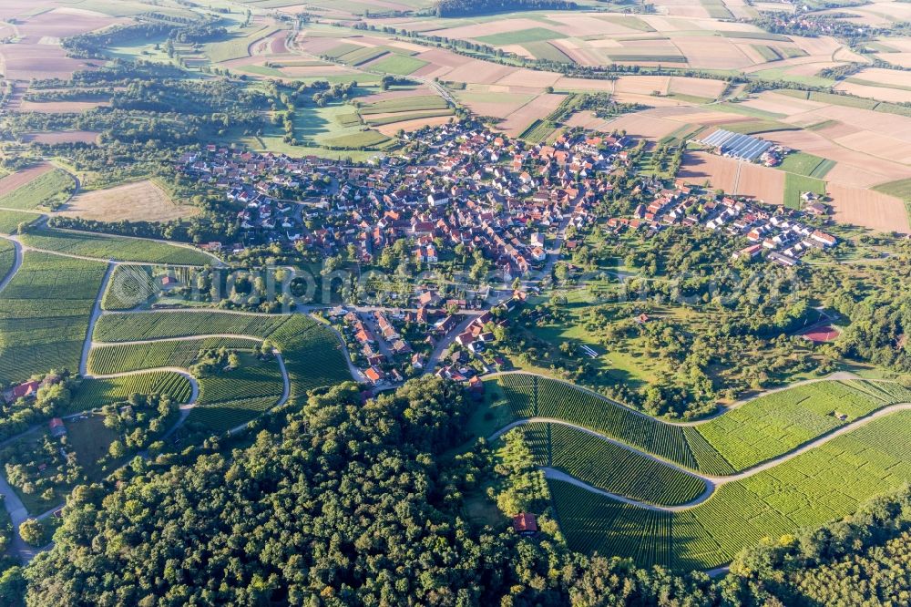 Winzerhausen from the bird's eye view: Village - view on the edge of agricultural fields and farmland in Winzerhausen in the state Baden-Wurttemberg, Germany