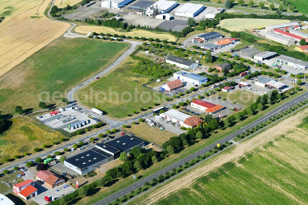 Woldegk from the bird's eye view: Village - view on the edge of agricultural fields and farmland in Woldegk in the state Mecklenburg - Western Pomerania, Germany