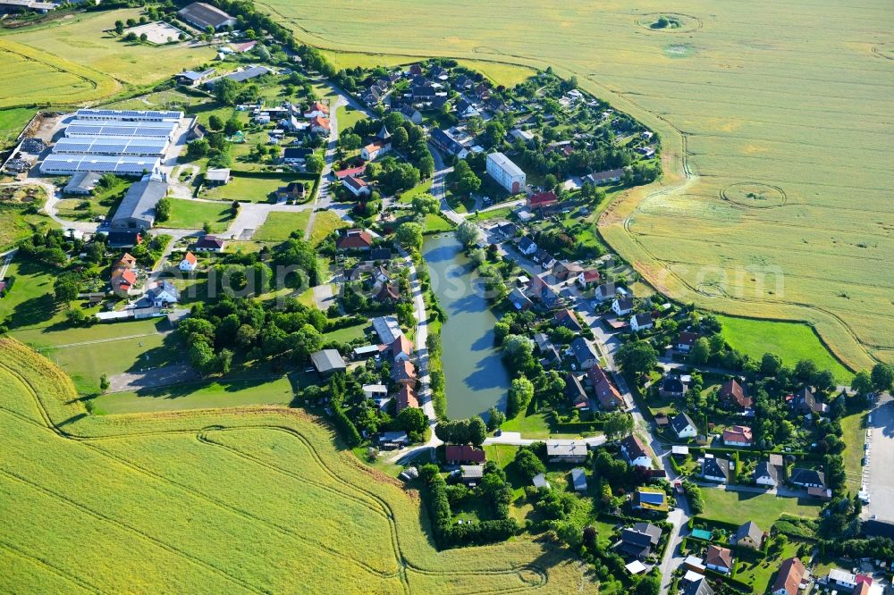 Zirzow from above - Village - view on the edge of agricultural fields and farmland in Zirzow in the state Mecklenburg - Western Pomerania, Germany