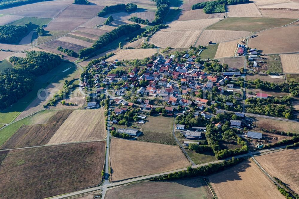 Aerial photograph Ahorn - Agricultural land and field borders surround the settlement area of the village in Ahorn in the state Baden-Wurttemberg, Germany