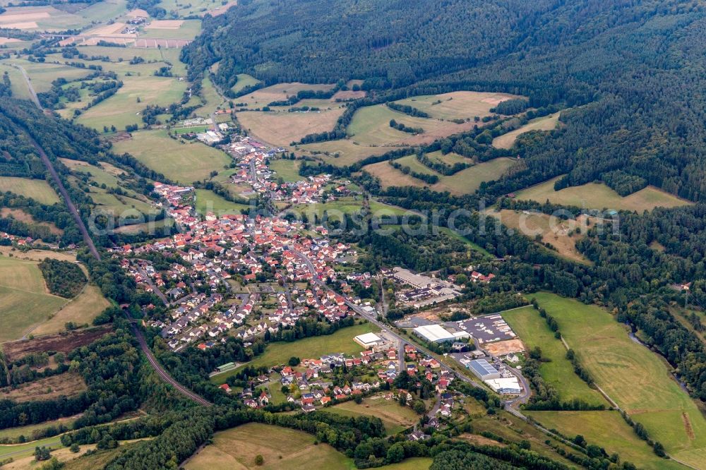 Aerial photograph Altengronau - Agricultural land and field borders surround the settlement area of the village in Altengronau in the state Hesse, Germany