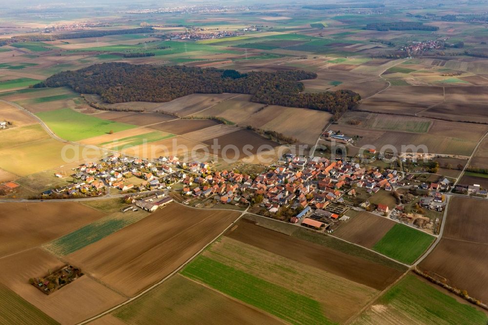 Aerial photograph Eichfeld - Agricultural land and field borders surround the settlement area of the village in Eichfeld in the state Bavaria, Germany