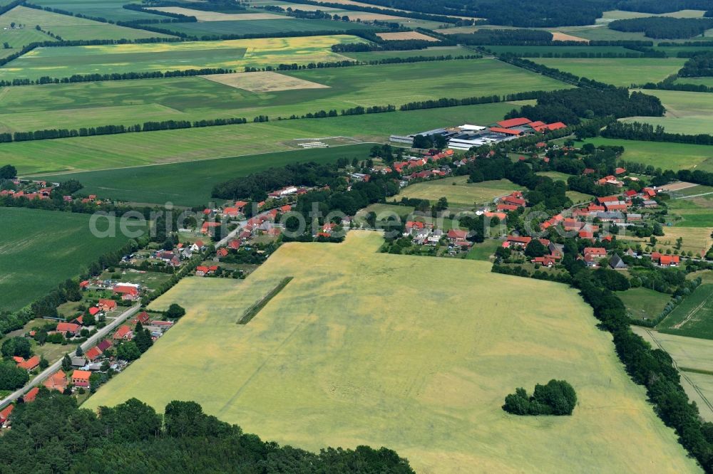 Glaisin from above - Agricultural land and field borders surround the settlement area of the village in Glaisin in the state Mecklenburg - Western Pomerania, Germany