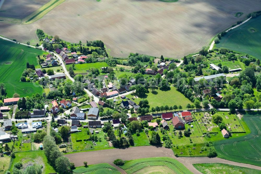 Granzin from above - Agricultural land and field borders surround the settlement area of the village in Granzin in the state Mecklenburg - Western Pomerania, Germany