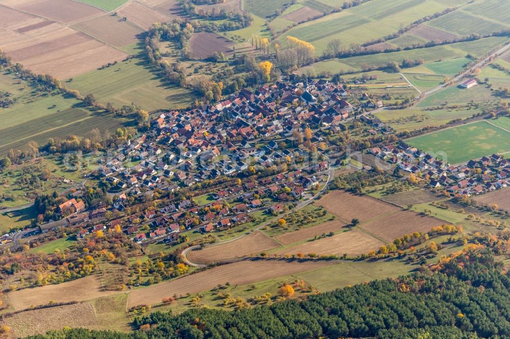 Hochhausen from the bird's eye view: Agricultural land and field borders surround the settlement area of the village in Hochhausen in the state Baden-Wurttemberg, Germany