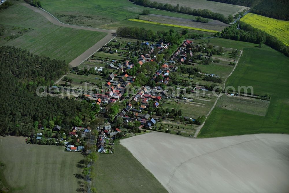 Aerial image Philippsthal - Agricultural land and field borders surround the settlement area of the village in Philippsthal in the state Brandenburg, Germany