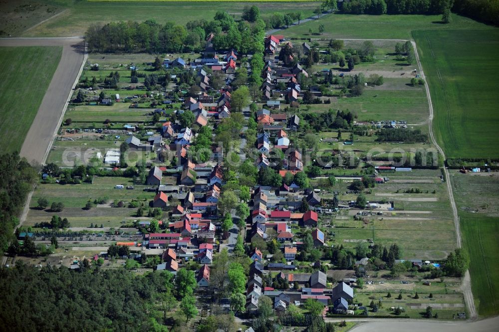 Aerial photograph Philippsthal - Agricultural land and field borders surround the settlement area of the village in Philippsthal in the state Brandenburg, Germany