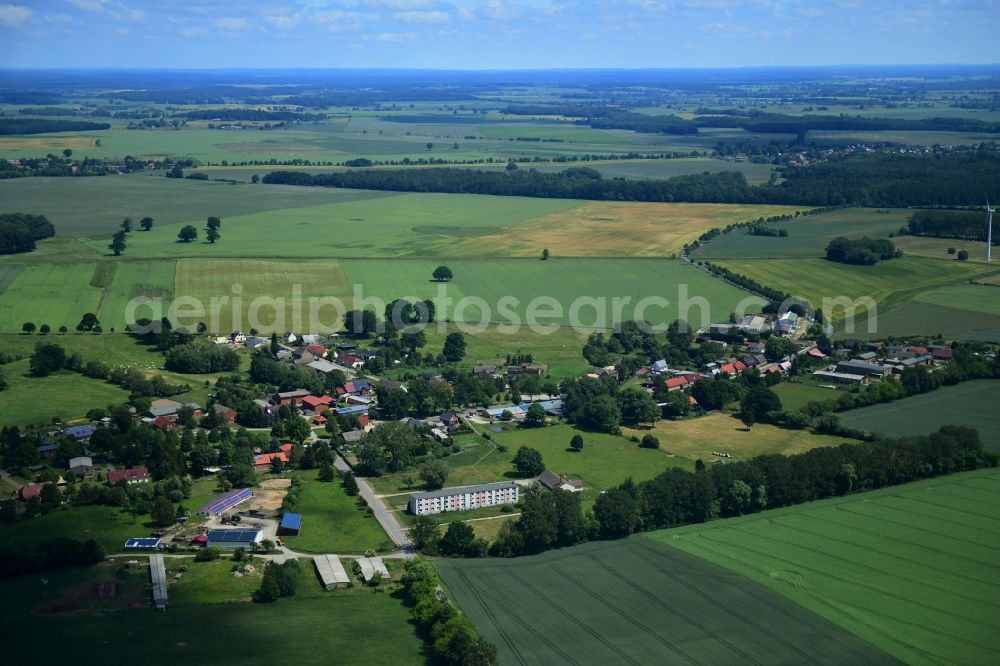 Aerial image Werder - Agricultural land and field borders surround the settlement area of the village in Werder in the state Mecklenburg - Western Pomerania, Germany