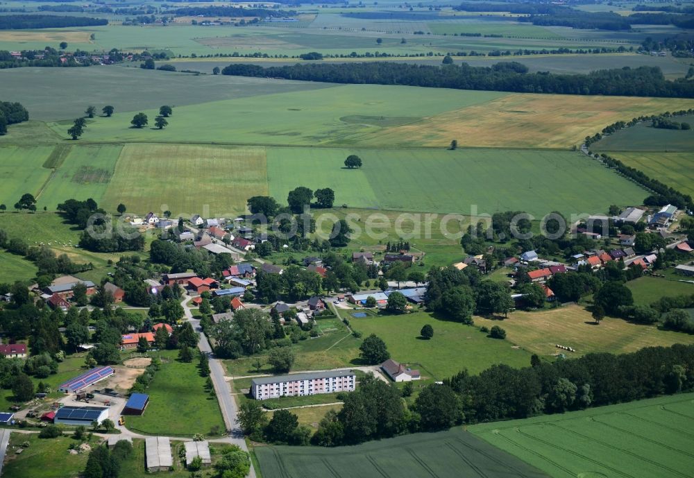 Aerial photograph Werder - Agricultural land and field borders surround the settlement area of the village in Werder in the state Mecklenburg - Western Pomerania, Germany