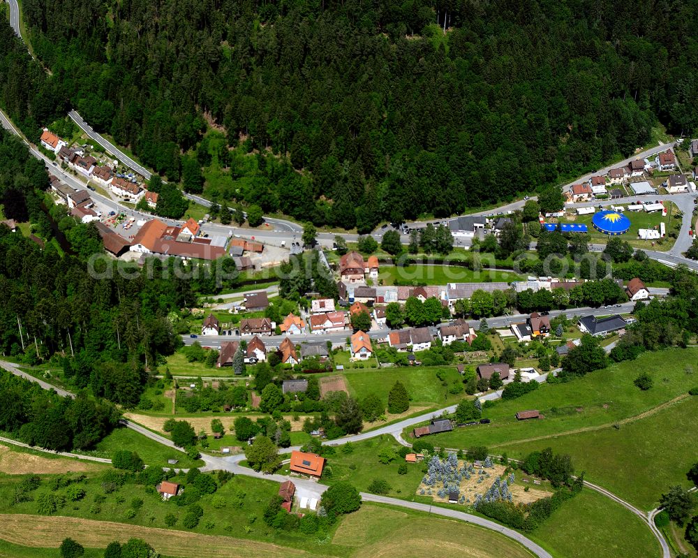 Altensteig from the bird's eye view: Village - view on the edge of forested areas in Altensteig in the state Baden-Wuerttemberg, Germany