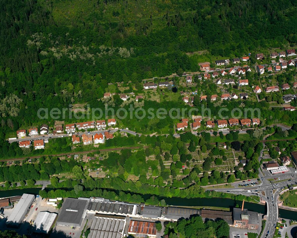 Alzenberg from the bird's eye view: Village - view on the edge of forested areas in Alzenberg in the state Baden-Wuerttemberg, Germany