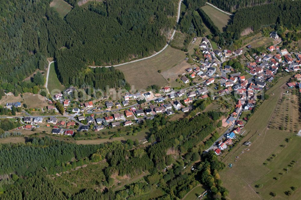 Aura im Sinngrund from the bird's eye view: Village - view on the edge of forested areas in Aura im Sinngrund in the state Bavaria, Germany