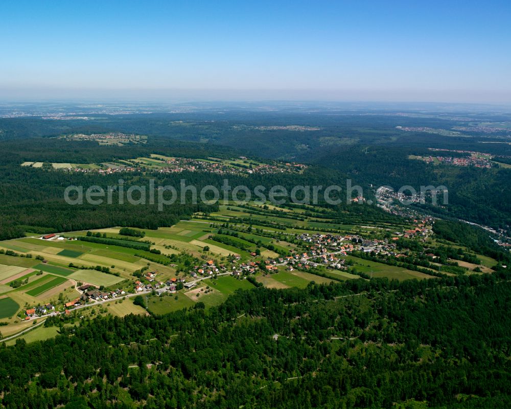 Bad Liebenzell from the bird's eye view: Village - view on the edge of forested areas in Bad Liebenzell in the state Baden-Wuerttemberg, Germany