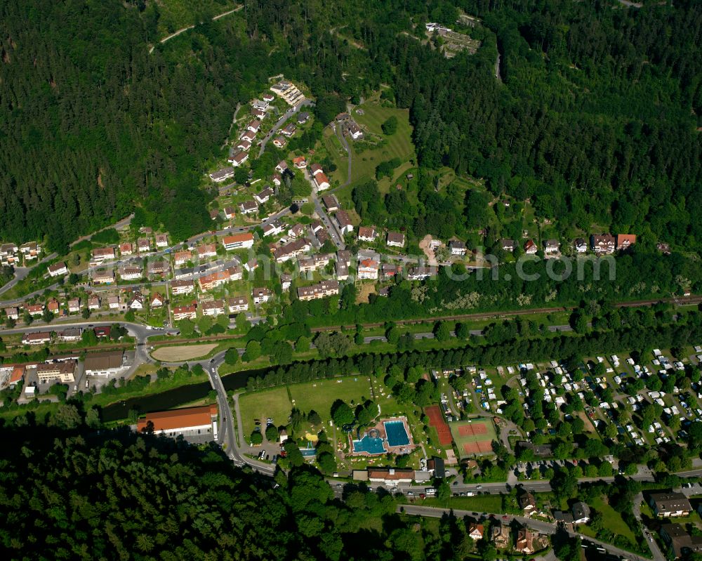 Bad Liebenzell from the bird's eye view: Village - view on the edge of forested areas in Bad Liebenzell in the state Baden-Wuerttemberg, Germany