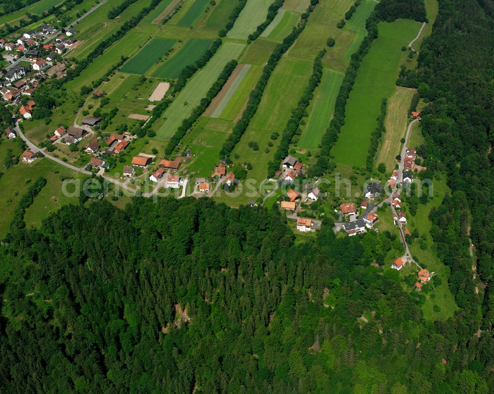 Bad Liebenzell from the bird's eye view: Village - view on the edge of forested areas in Bad Liebenzell in the state Baden-Wuerttemberg, Germany