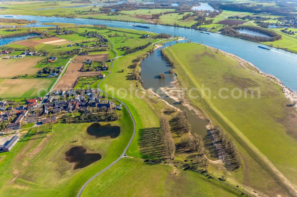 Bislich from above - Village - view on the edge of forested areas in Bislich in the state North Rhine-Westphalia, Germany