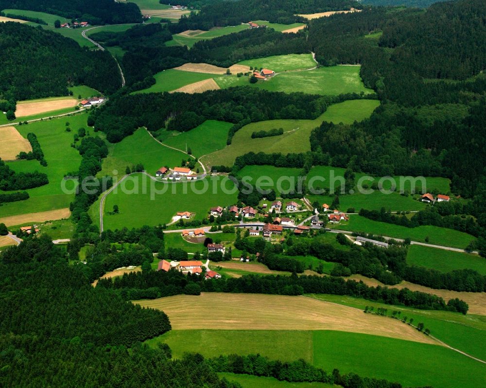 Aerial image Buglmühl - Village - view on the edge of forested areas in Buglmühl in the state Bavaria, Germany