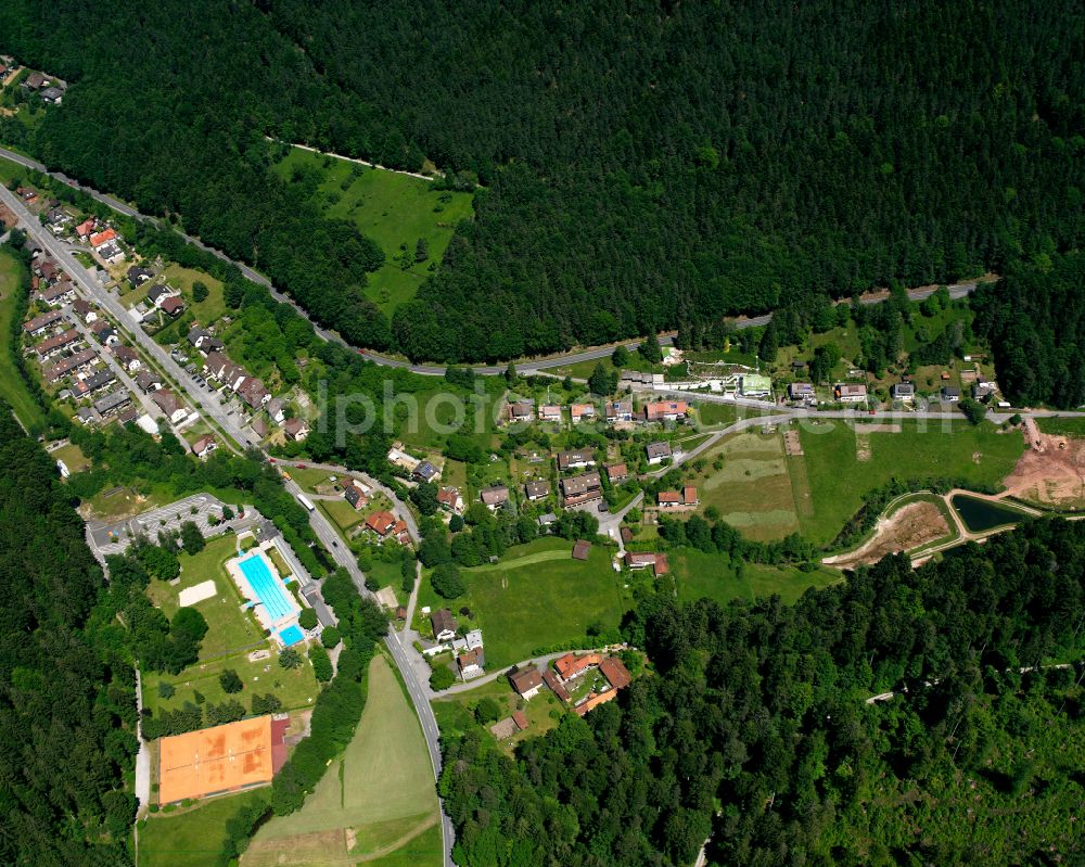 Calmbach from the bird's eye view: Village - view on the edge of forested areas in Calmbach in the state Baden-Wuerttemberg, Germany