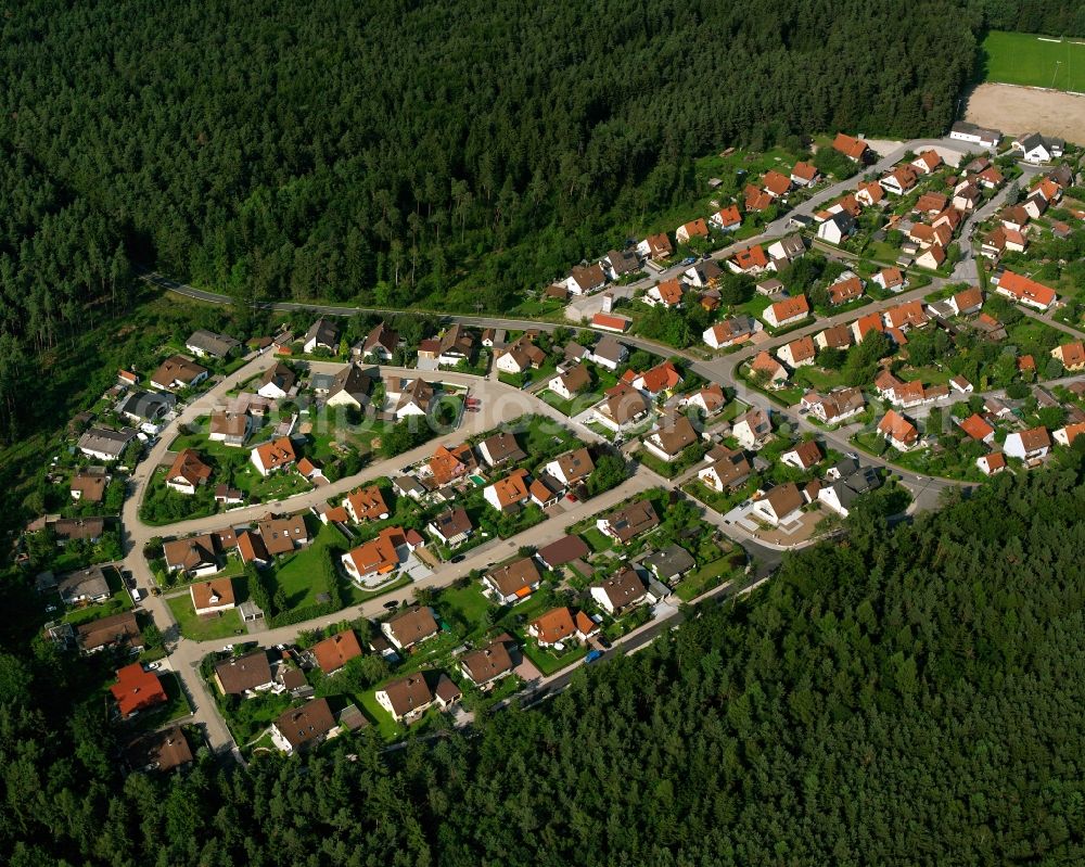 Dentlein am Forst from the bird's eye view: Village - view on the edge of forested areas in Dentlein am Forst in the state Bavaria, Germany