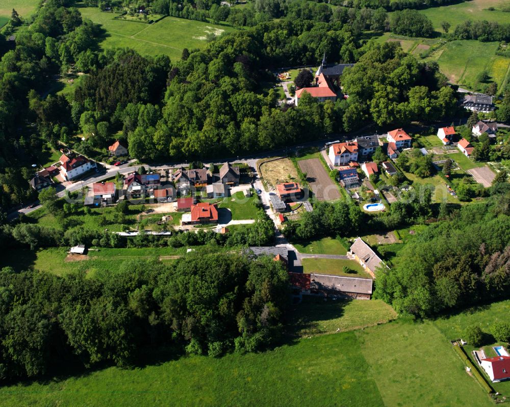 Dingelstädt from above - Village - view on the edge of forested areas in Dingelstädt in the state Thuringia, Germany