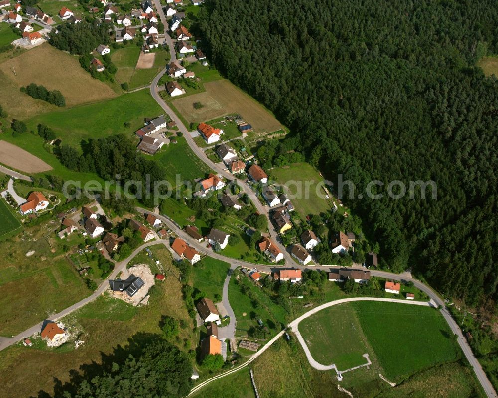 Erlmühle from the bird's eye view: Village - view on the edge of forested areas in Erlmühle in the state Bavaria, Germany