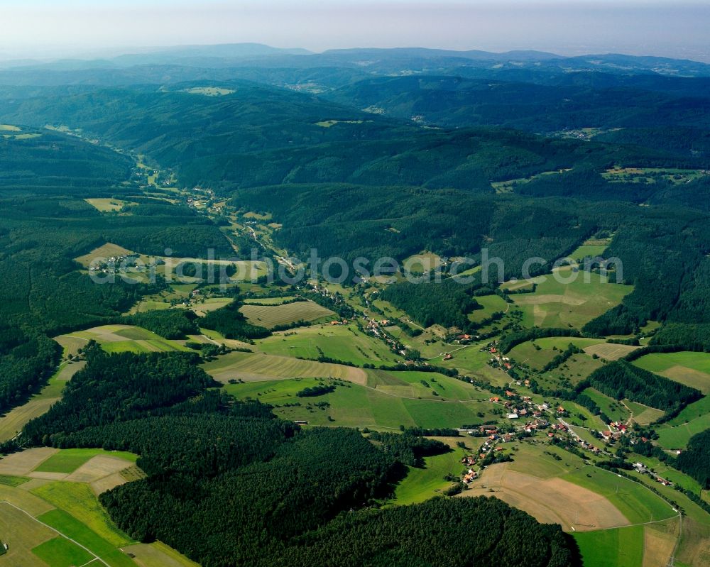 Falken-Gesäß from the bird's eye view: Village - view on the edge of forested areas in Falken-Gesäß in the state Hesse, Germany