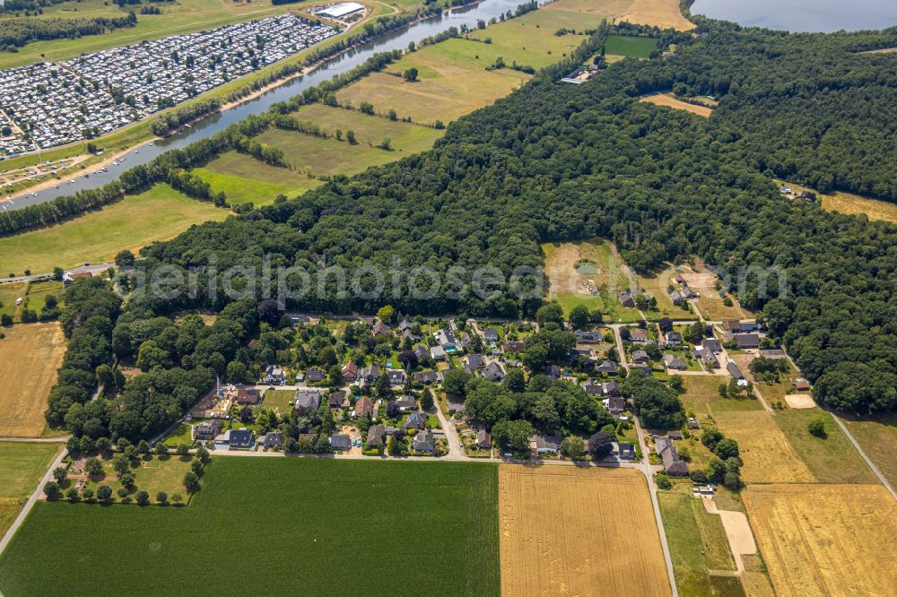 Flürener Feld from above - Village - view on the edge of forested areas in Flürener Feld in the state North Rhine-Westphalia, Germany