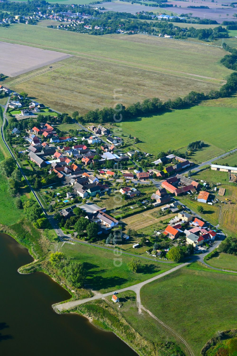 Gallin from the bird's eye view: Village - view on the edge of forested areas in Gallin in the state Saxony-Anhalt, Germany