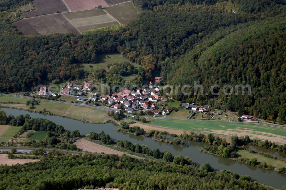 Harrbach from the bird's eye view: Village - view on the edge of forested areas in Harrbach in the state Bavaria, Germany