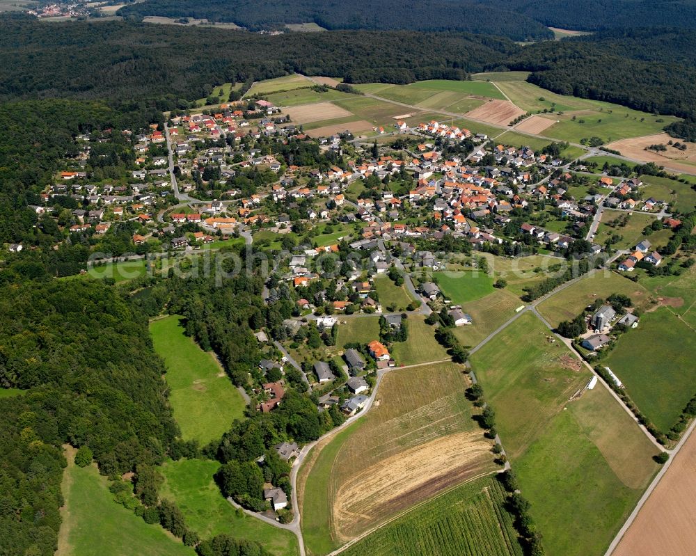 Aerial image Hassenroth - Village - view on the edge of forested areas in Hassenroth in the state Hesse, Germany