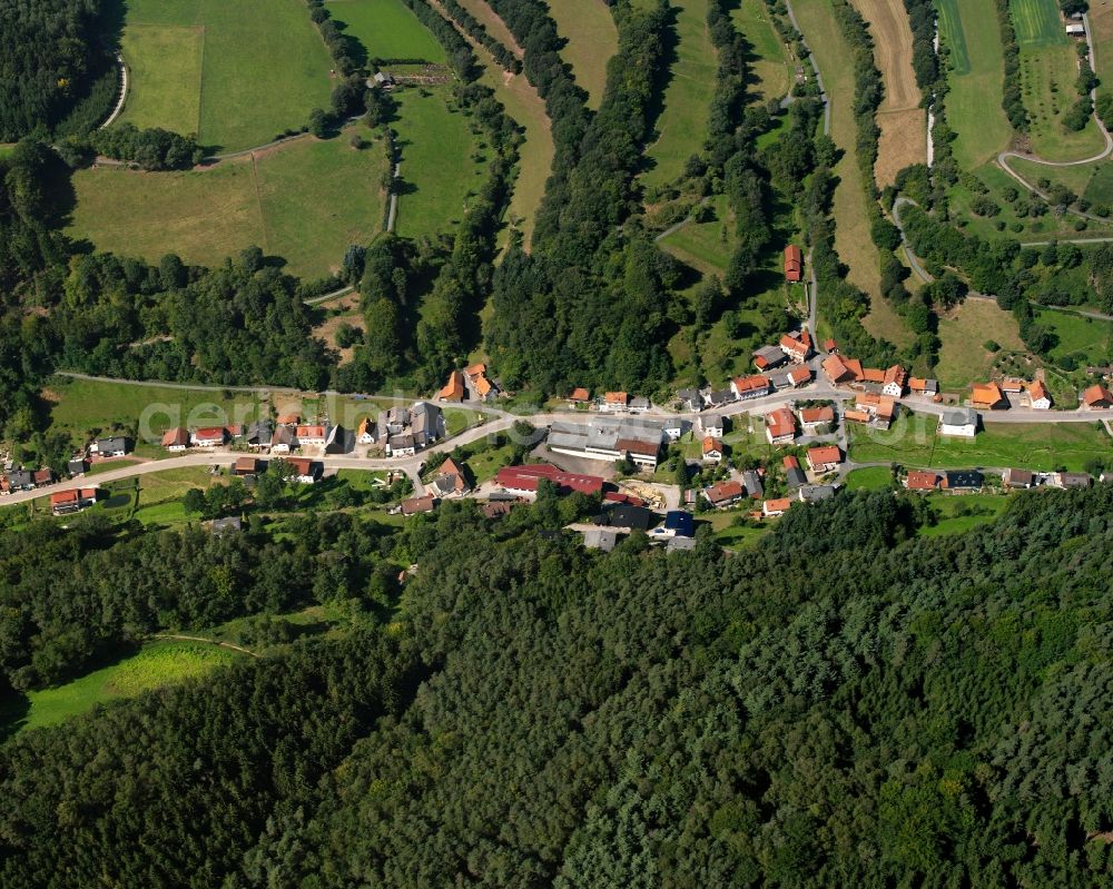 Hebstahl from the bird's eye view: Village - view on the edge of forested areas in Hebstahl in the state Hesse, Germany