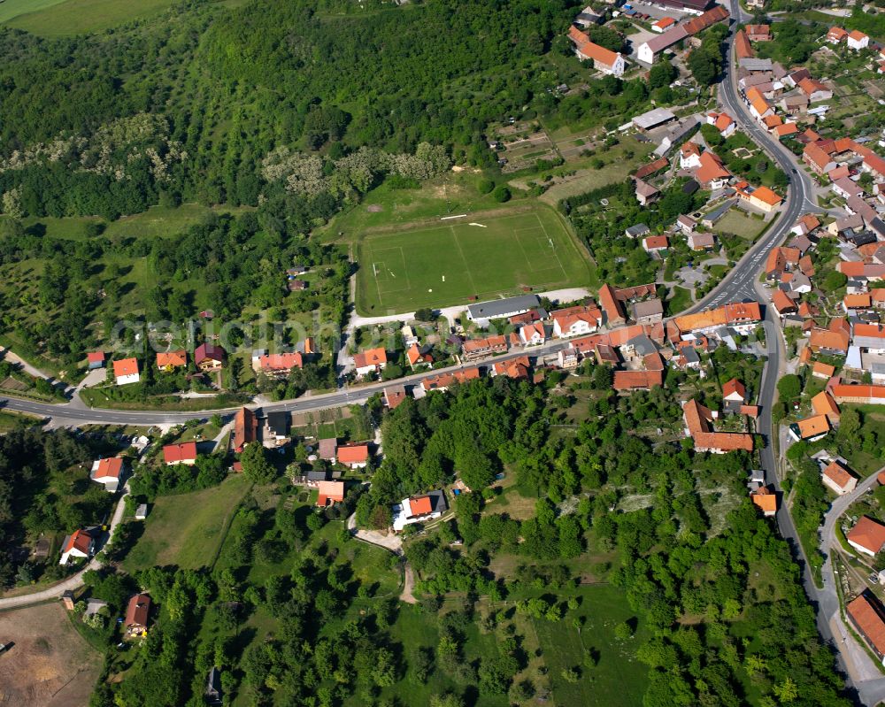 Heimburg from the bird's eye view: Village - view on the edge of forested areas in Heimburg in the state Saxony-Anhalt, Germany