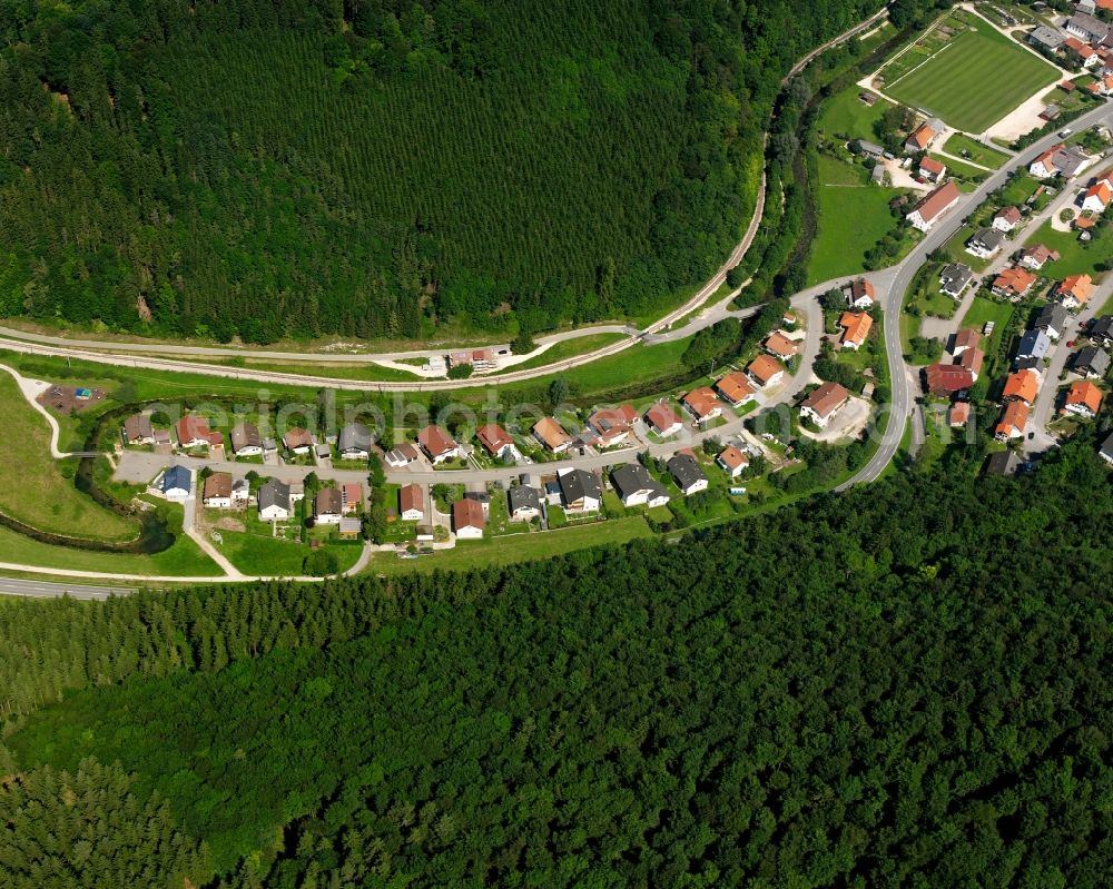 Hettingen from the bird's eye view: Village - view on the edge of forested areas in Hettingen in the state Baden-Wuerttemberg, Germany