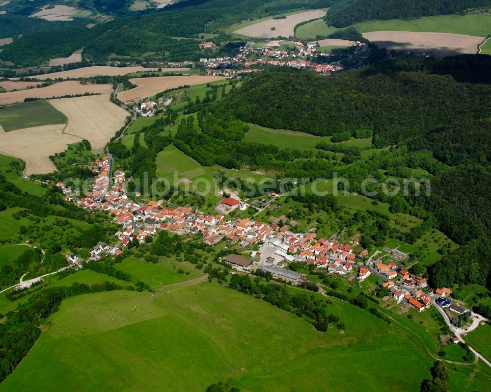 Hildebrandshausen from above - Village - view on the edge of forested areas in Hildebrandshausen in the state Thuringia, Germany