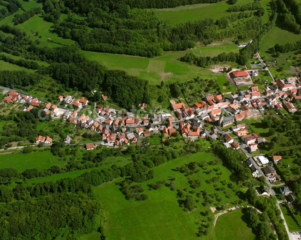 Aerial image Hildebrandshausen - Village - view on the edge of forested areas in Hildebrandshausen in the state Thuringia, Germany