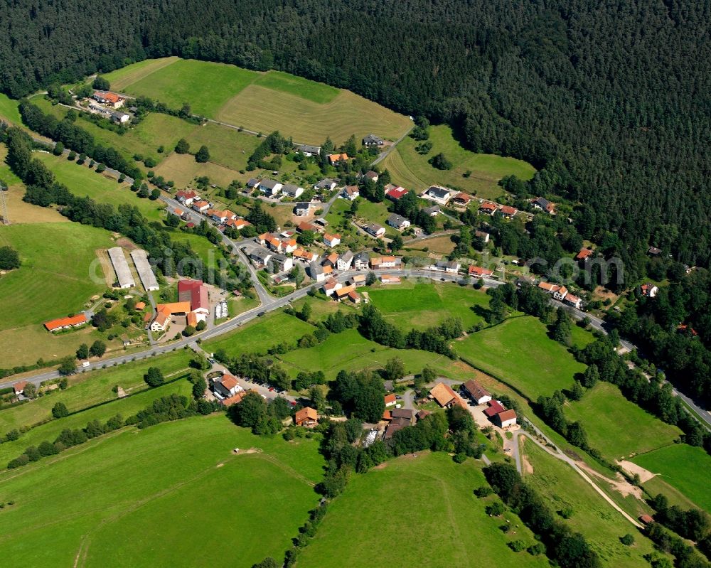 Aerial photograph Hüttenthal - Village - view on the edge of forested areas in Hüttenthal in the state Hesse, Germany