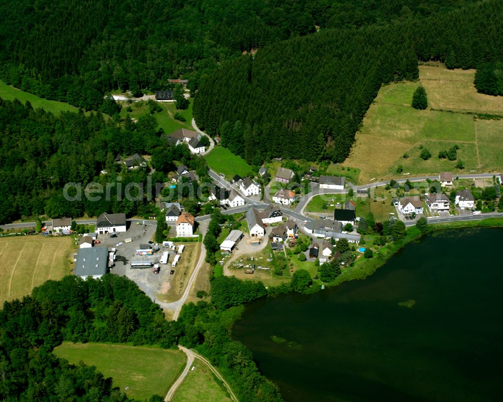 Hunswinkel from above - Village - view on the edge of forested areas in Hunswinkel in the state North Rhine-Westphalia, Germany