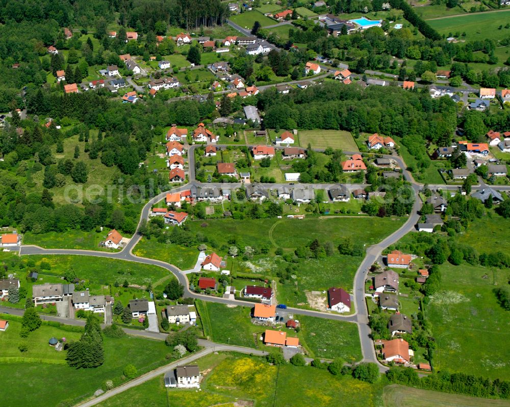 Ilbeshausen-Hochwaldhausen from above - Village - view on the edge of forested areas in Ilbeshausen-Hochwaldhausen in the state Hesse, Germany