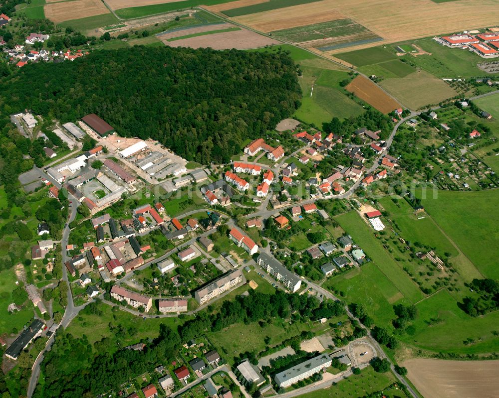 Kleinaga from the bird's eye view: Village - view on the edge of forested areas in Kleinaga in the state Thuringia, Germany