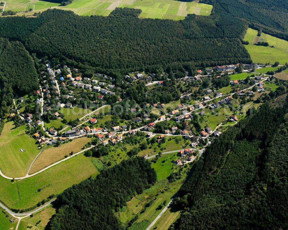 Kortelshütte from the bird's eye view: Village - view on the edge of forested areas in Kortelshütte in the state Hesse, Germany