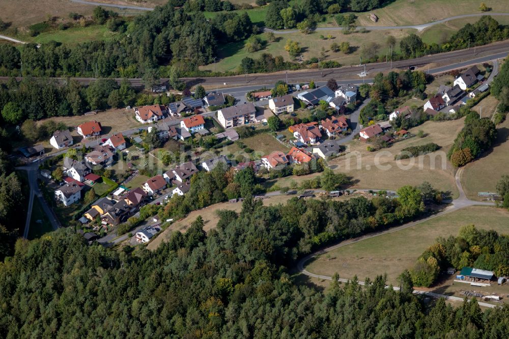 Krommenthal from the bird's eye view: Village - view on the edge of forested areas in Krommenthal in the state Bavaria, Germany