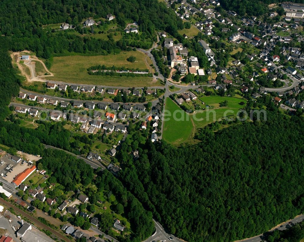 Kunst-Wittgenstein from the bird's eye view: Village - view on the edge of forested areas in Kunst-Wittgenstein in the state North Rhine-Westphalia, Germany