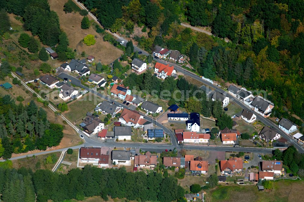 Aerial photograph Neustadt am Main - Village - view on the edge of forested areas in Neustadt am Main in the state Bavaria, Germany