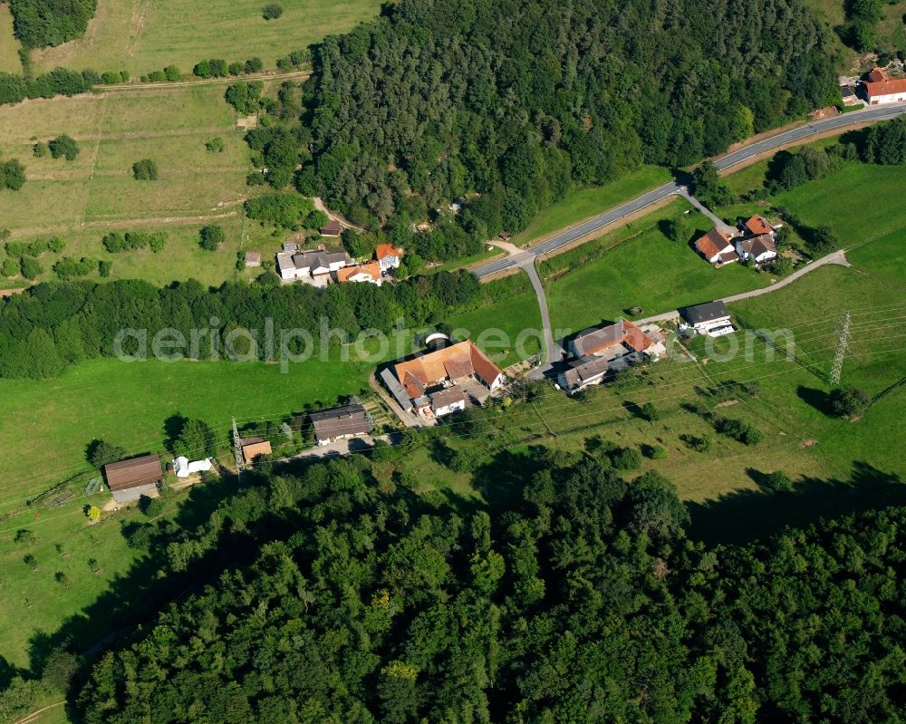 Ober-Kainsbach from the bird's eye view: Village - view on the edge of forested areas in Ober-Kainsbach in the state Hesse, Germany